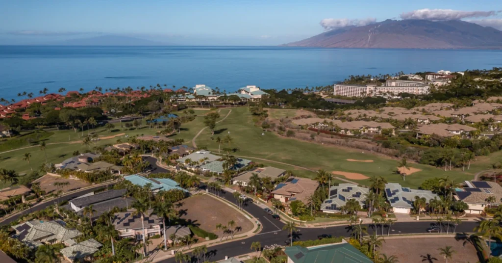 Wailea Golf Vistas from above with the Wailea Blue Course, the Four Seasons, and the Grand Wailea in the distance. 