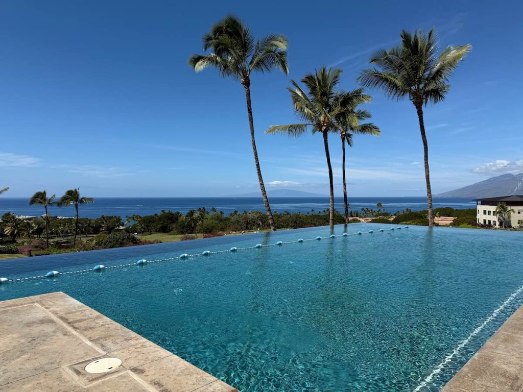 One of the selling points for Kai Malu Condos for Sale is the pool and recreation area. The infinity pool shown in the photo has stunning ocean views. 