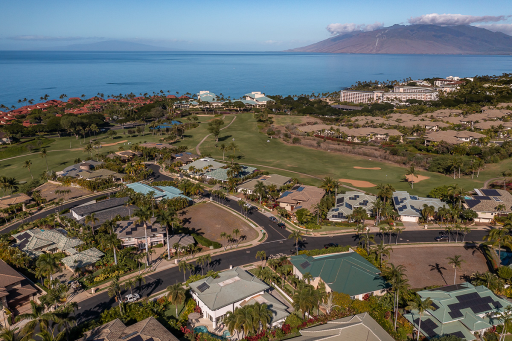 Wailea Golf Vistas from above with the Wailea Blue Course, the Four Seasons, and the Grand Wailea in the distance. 
