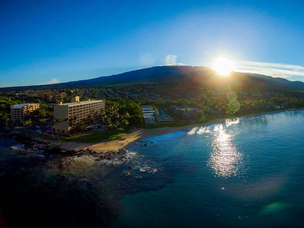 Buying a Maui Home to Vacation Rent: What Is Legal in 2026 1 Maui short term rental for sale: aerial view of hotel zoned condo buildings along the Kihei shoreline in South Maui