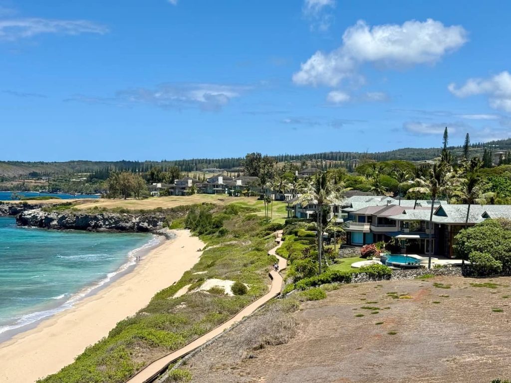 Homes in Kapalua Place are elevated above Oneloa Beach