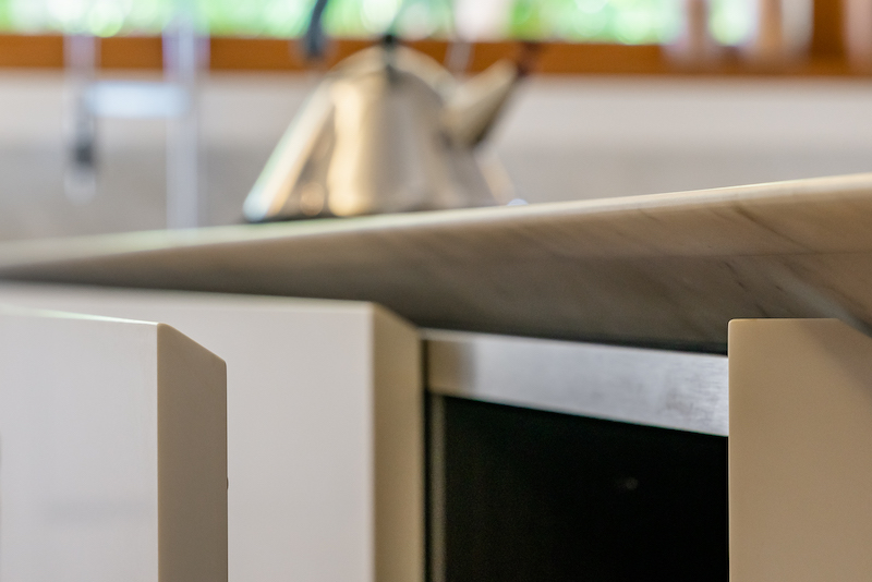 Beveled edges on the marble and the Boffi Cabinetry in the Kitchen of the Oasis. 