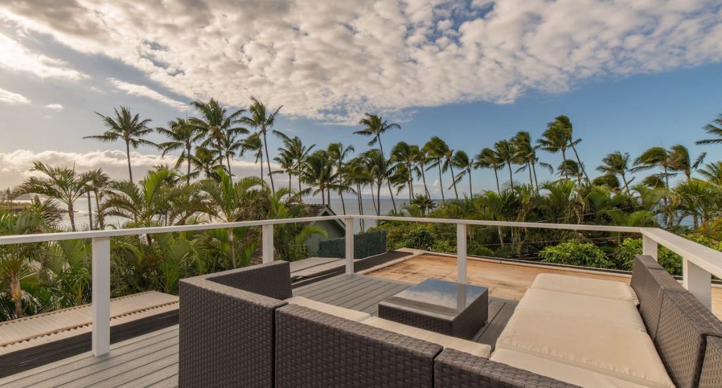 Cover Photo for the March 2026 Maui Statistics and Market Update showing the roof top deck views from 55 Kai Place