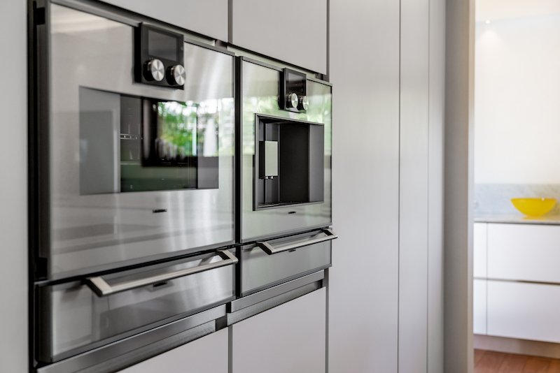 Gaggenau oven, coffee and espresso makers and warming trays. 