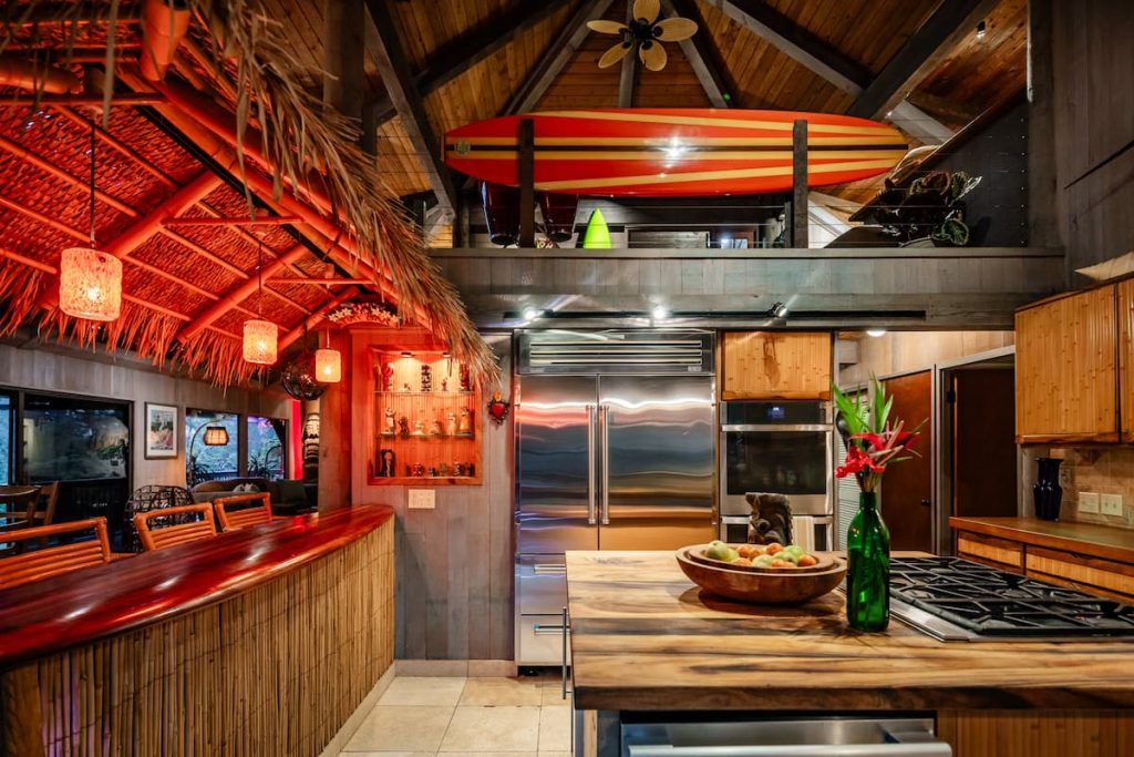 The spacious kitchen is fun and well-suited for entertainment. The tiki breakfast bar, subzero fridge and spacious cooking area are great for informal meals or whipping up a feast for the masses. 